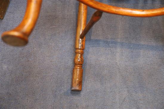 An early 19th century yew, ash and elm Windsor chair, W.2ft D.1ft 9in. H.3ft 5in.